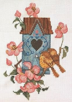 Casetta con uccellini